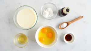Keto crème brûlée ingredients including heavy cream, egg yolks, vanilla extract, and sweetener.